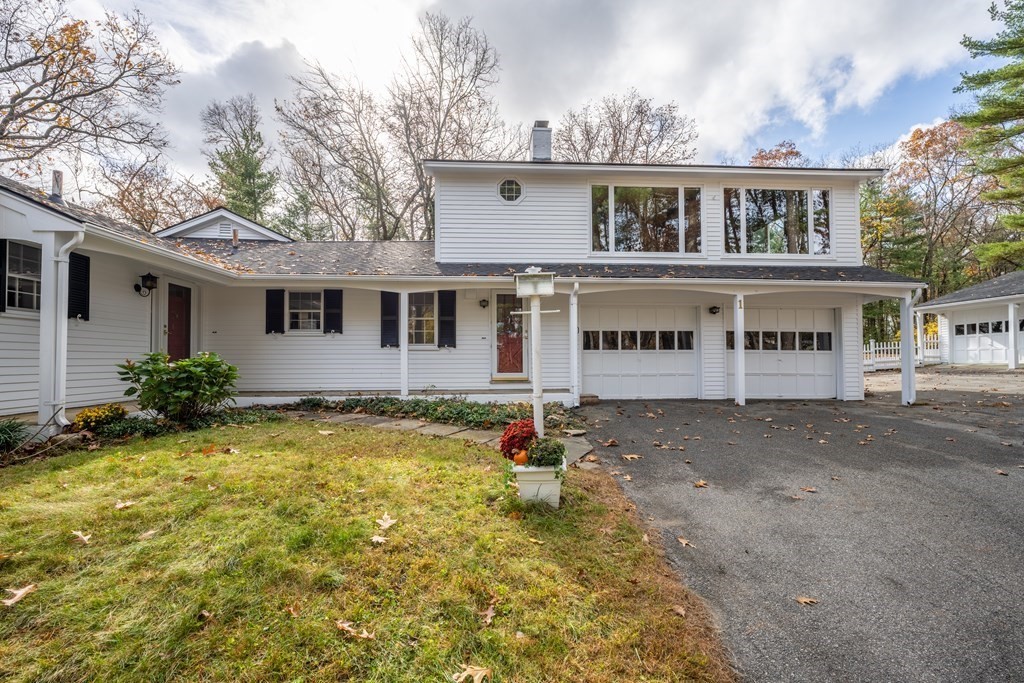 1 Maynard Street Northborough, MA 01532 - Photo 1 of 41 a front view of a house with garden