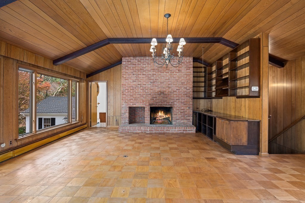 1 Maynard Street Northborough, MA 01532 - Photo 22 of 41 a view of an empty room with a fireplace