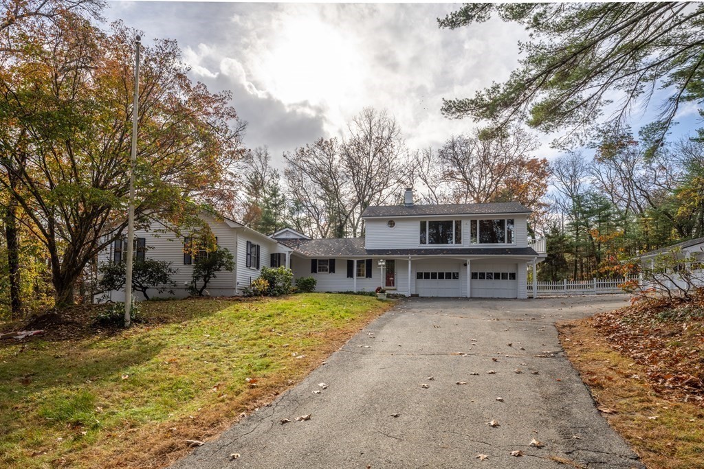 1 Maynard Street Northborough, MA 01532 - Photo 37 of 41 a view of a house with a large tree in front of it