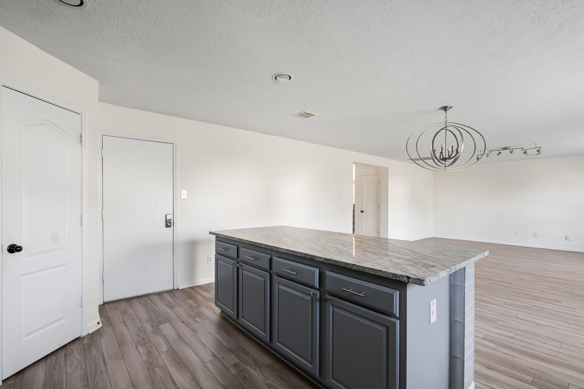 18102 Clayton Bluff Lane Cypress, TX 77433 - Photo 12 of 30 a kitchen with a sink and cabinets
