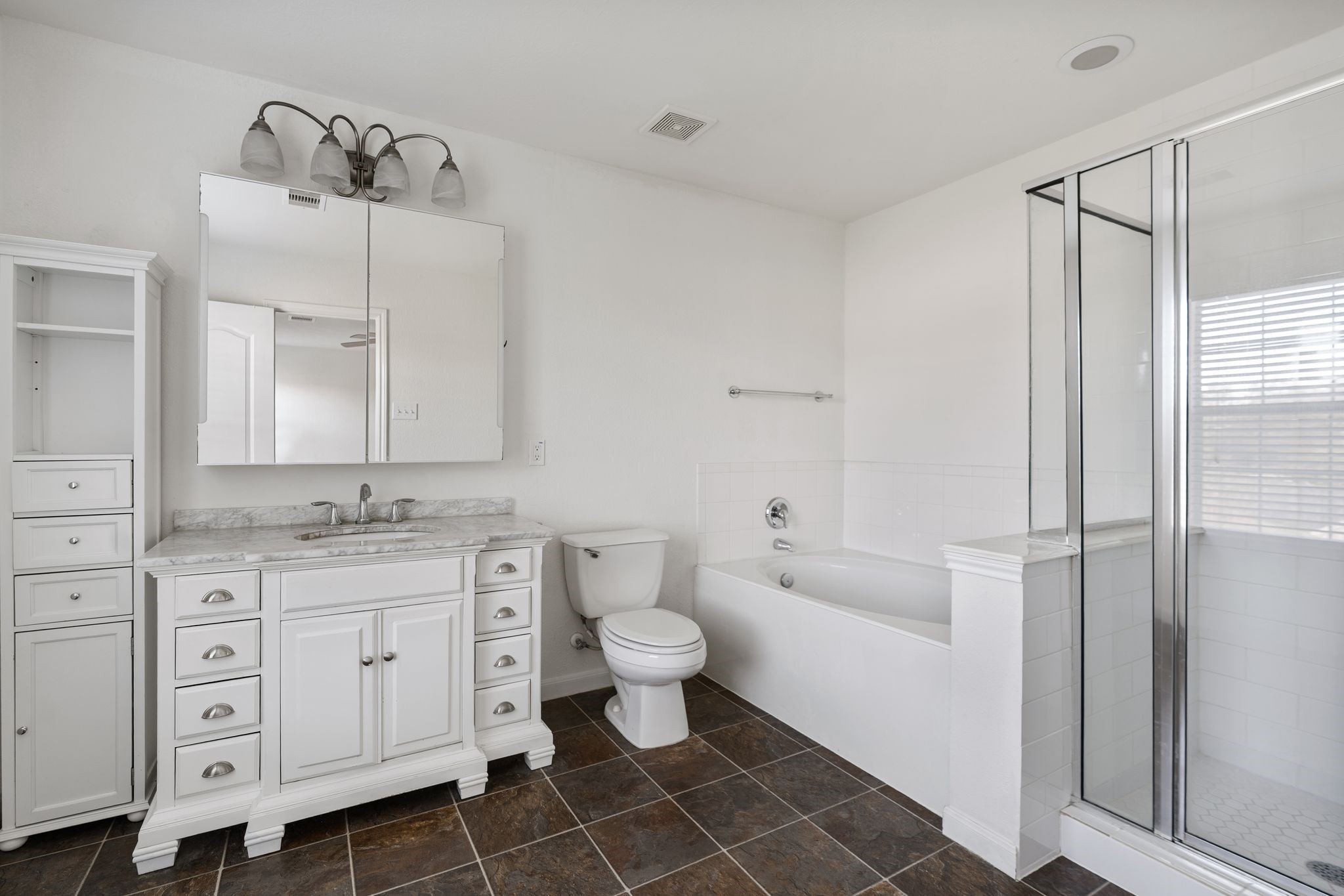 18102 Clayton Bluff Lane Cypress, TX 77433 - Photo 21 of 30 a bathroom with a granite countertop sink a toilet and a mirror