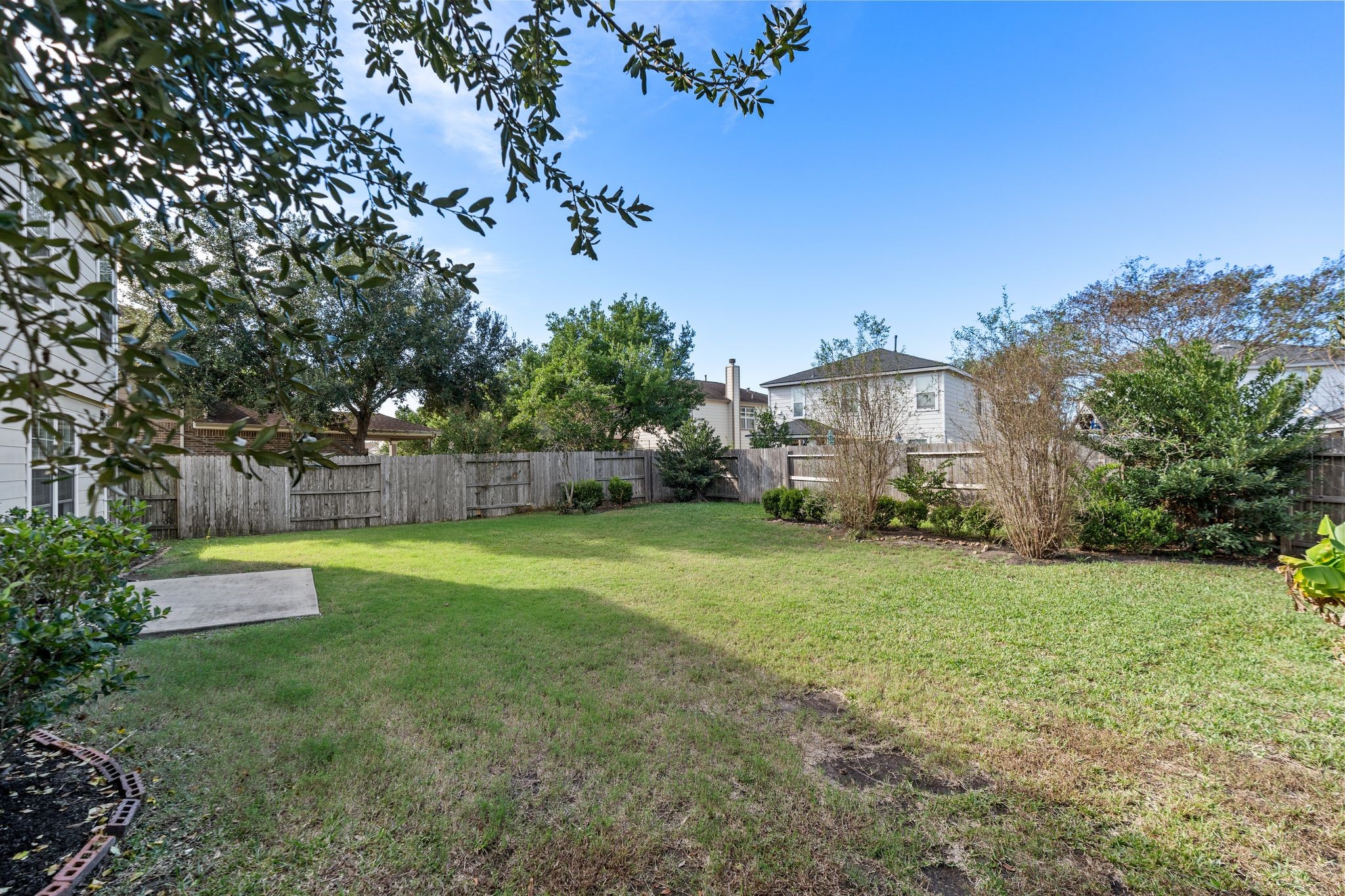 18102 Clayton Bluff Lane Cypress, TX 77433 - Photo 29 of 30 a front view of a house with a yard and trees