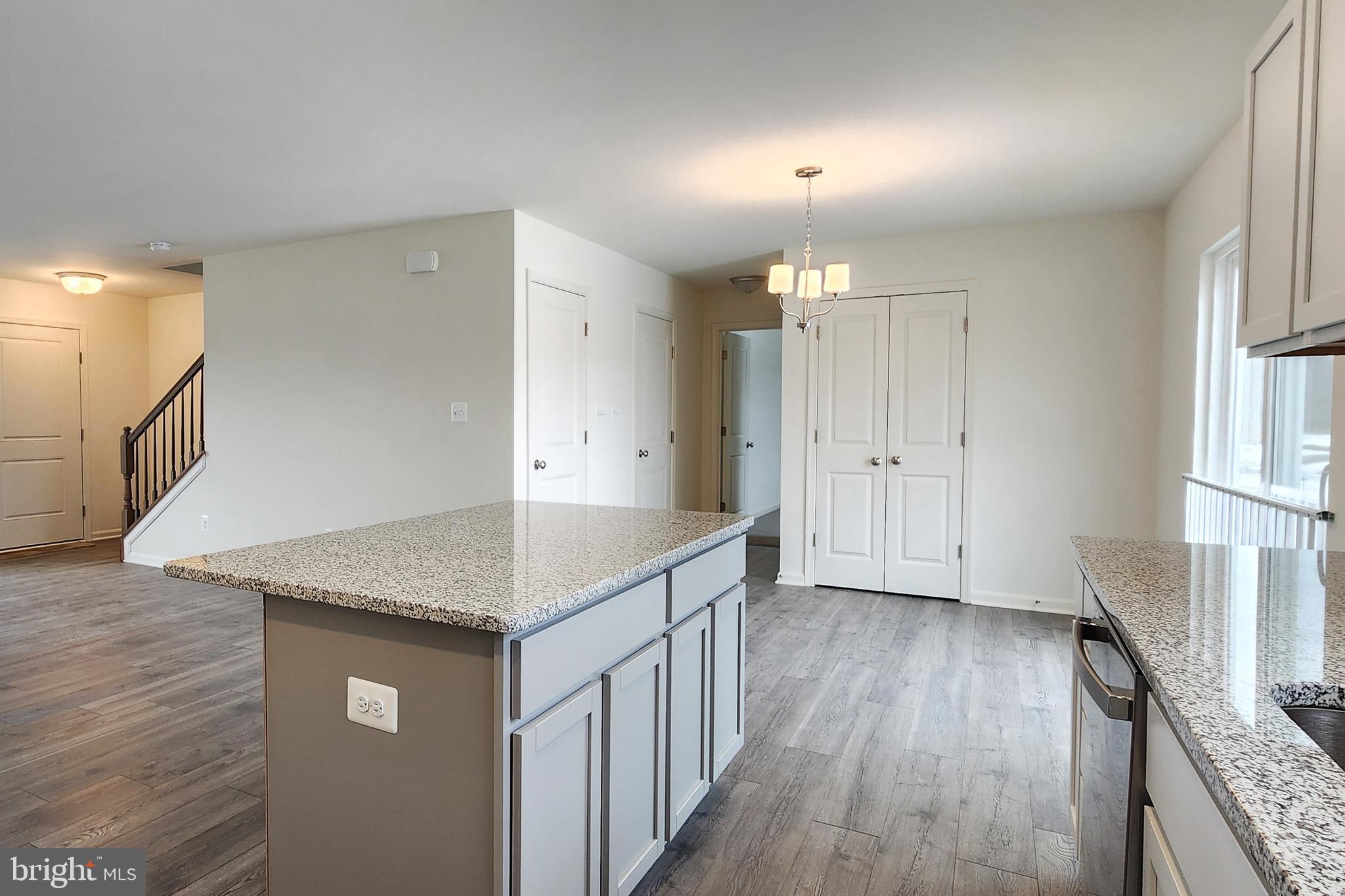 5407 Harrier Way Waynesboro, PA 17268 - Photo 22 of 35 a kitchen that has a microwave a sink and a stove in it