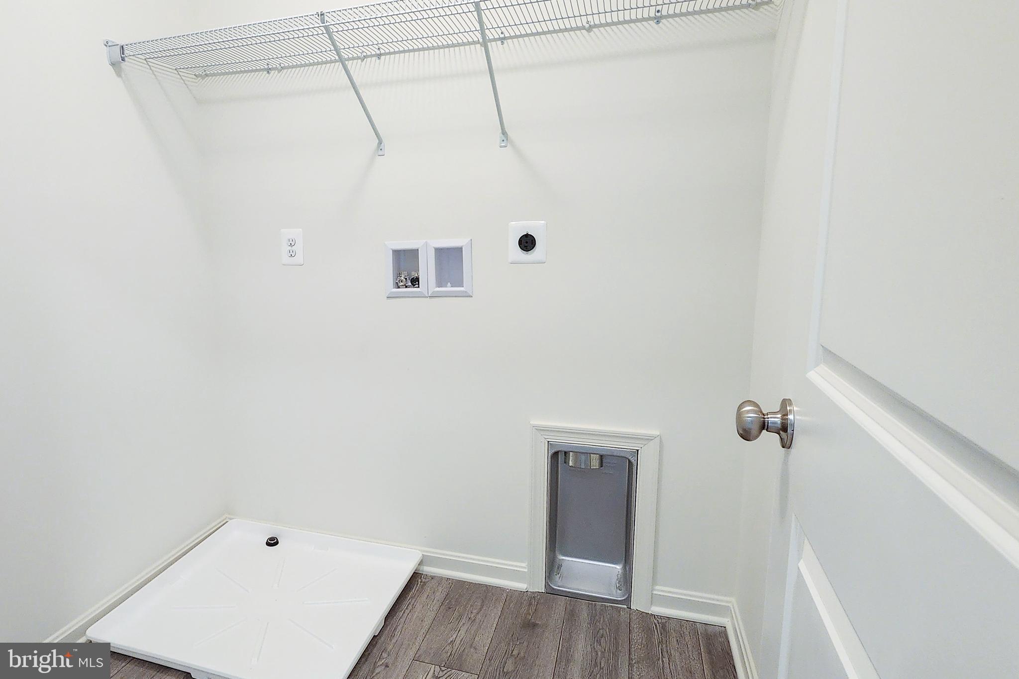 5407 Harrier Way Waynesboro, PA 17268 - Photo 24 of 35 a view of a room with wooden floor and cabinet