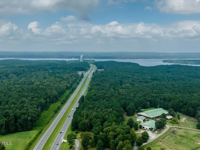 a view of a pathway with a yard