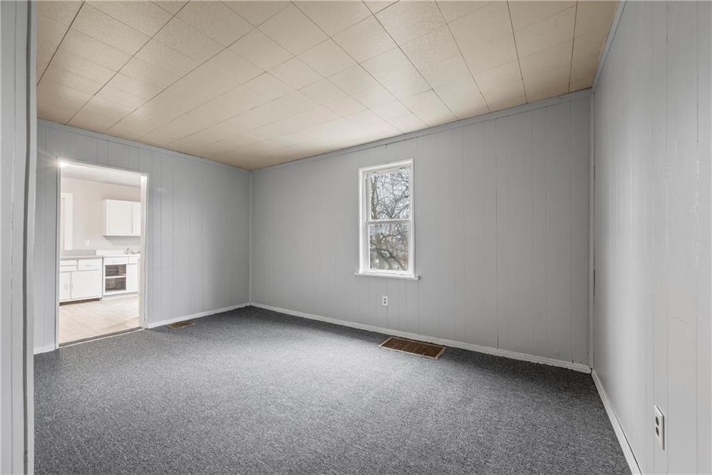 214 Grape Way Clairton, PA 15025 - Photo 4 of 13 an empty room with a empty space and windows