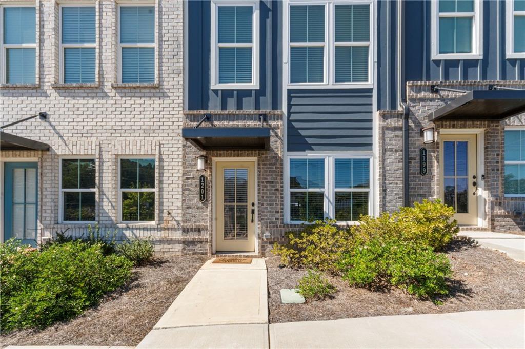 1201 Skylar Lane Southeast Atlanta, GA 30315 - Photo 2 of 37 front view of a brick building