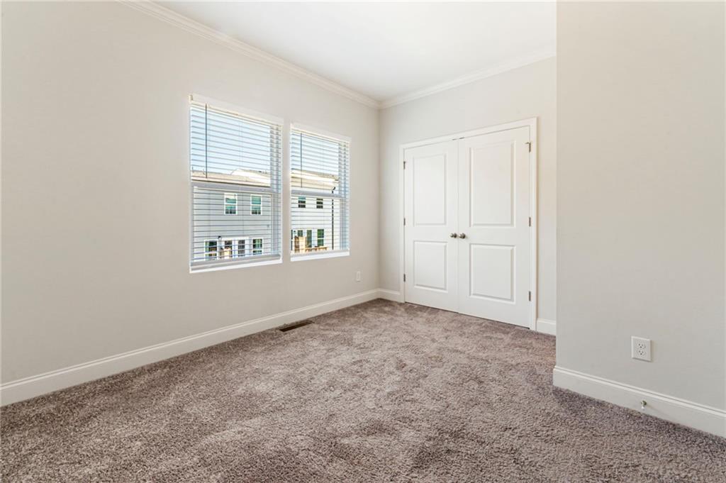 1201 Skylar Lane Southeast Atlanta, GA 30315 - Photo 22 of 37 an empty room with windows
