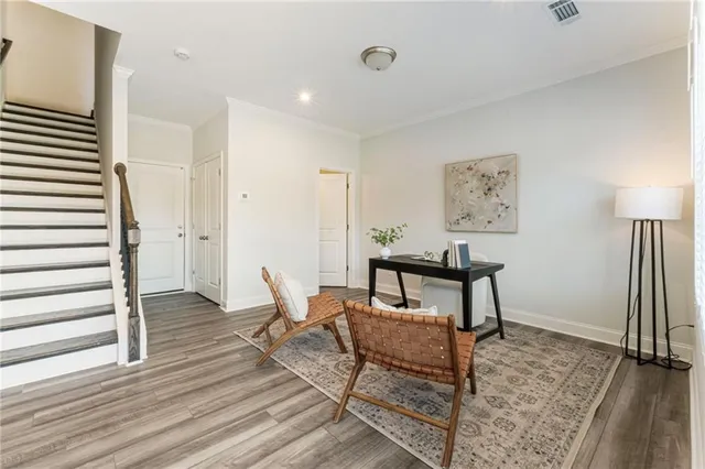 a view of a livingroom with furniture and a table