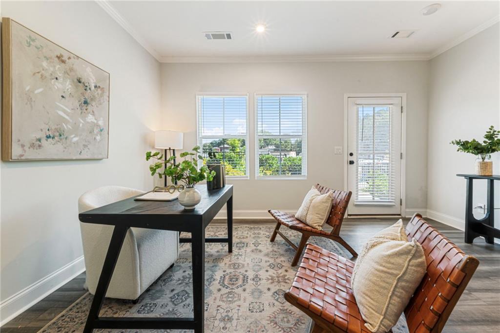 1201 Skylar Lane Southeast Atlanta, GA 30315 - Photo 27 of 37 a living room with furniture a window and a potted plant
