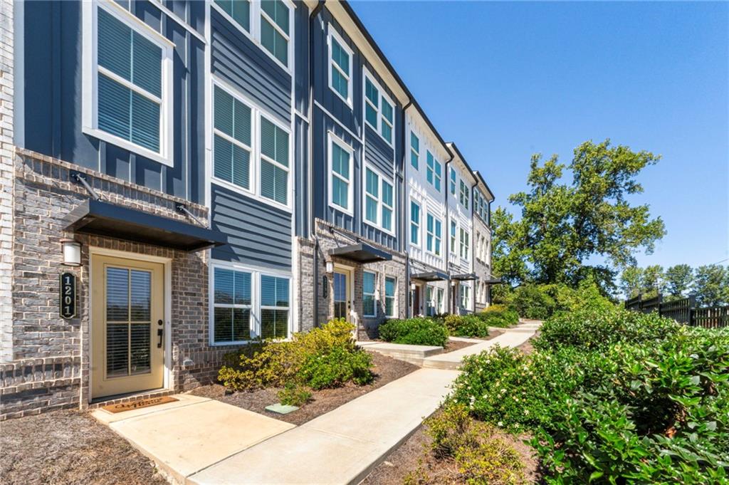 1201 Skylar Lane Southeast Atlanta, GA 30315 - Photo 29 of 37 a front view of a multi story residential apartment building