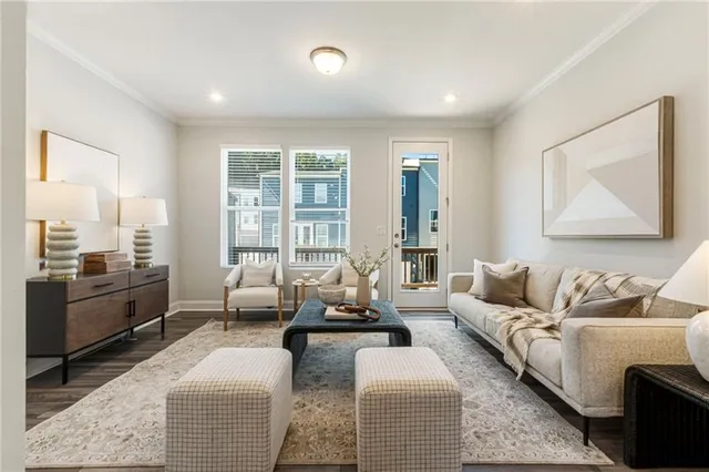 a living room with furniture or couch and a stove top oven