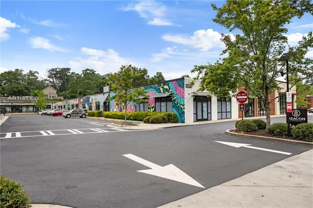 a front view of building with street view