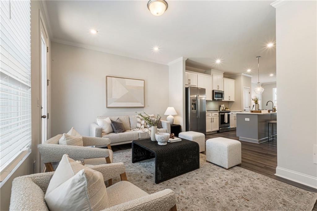 1201 Skylar Lane Southeast Atlanta, GA 30315 - Photo 5 of 37 a living room with furniture and kitchen view