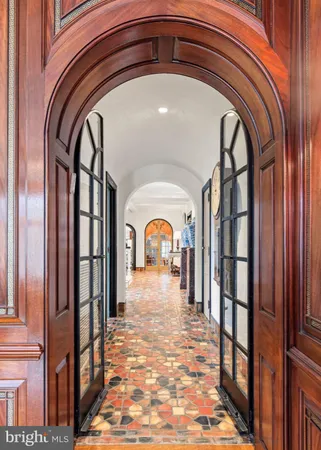 a living room with furniture window and lamp