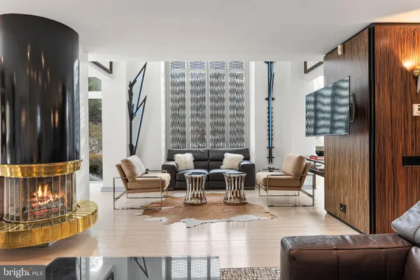 a living room with furniture and a window