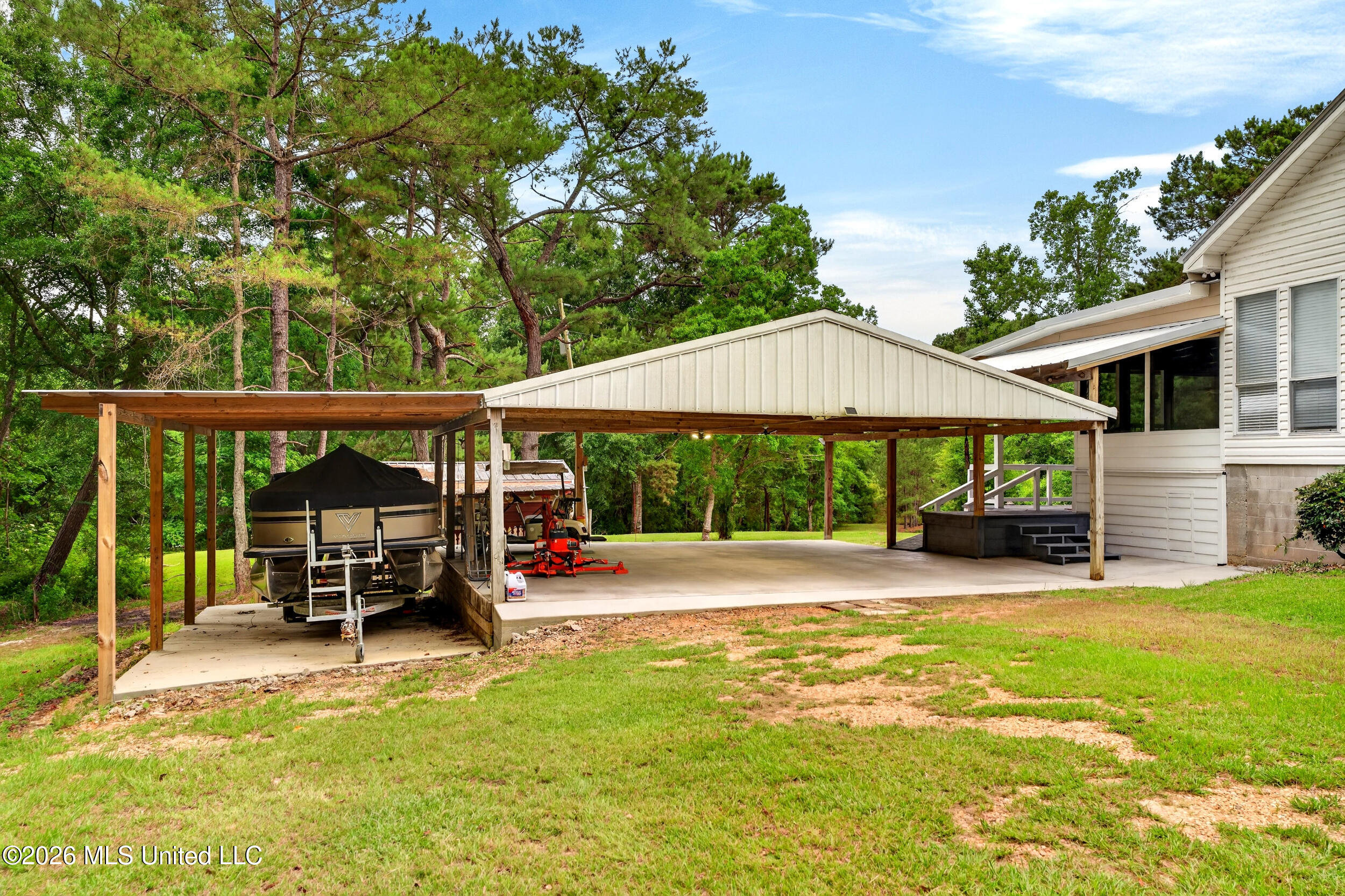 219 Pop Hill Road, Unit B Poplarville, MS 39470 - Photo 7 of 74 7_07_carport