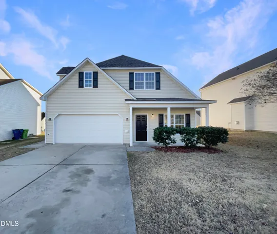 a view of outdoor space yard and garage