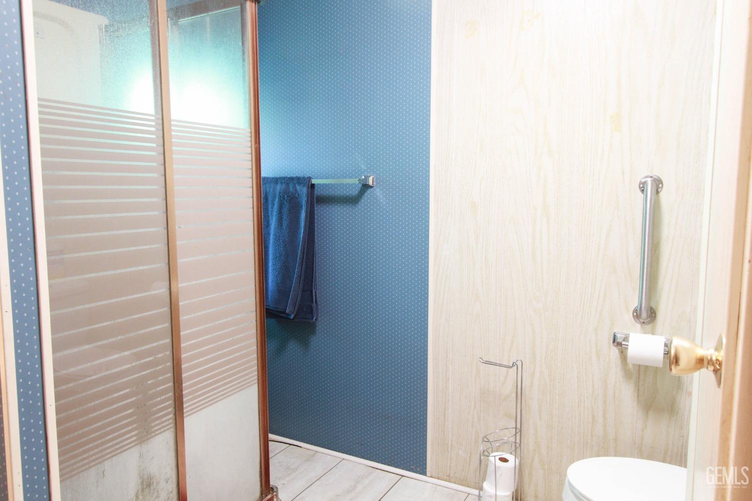 Undisclosed Address Bakersfield, CA 93304 - Photo 19 of 27 a bathroom with a sink and toilet