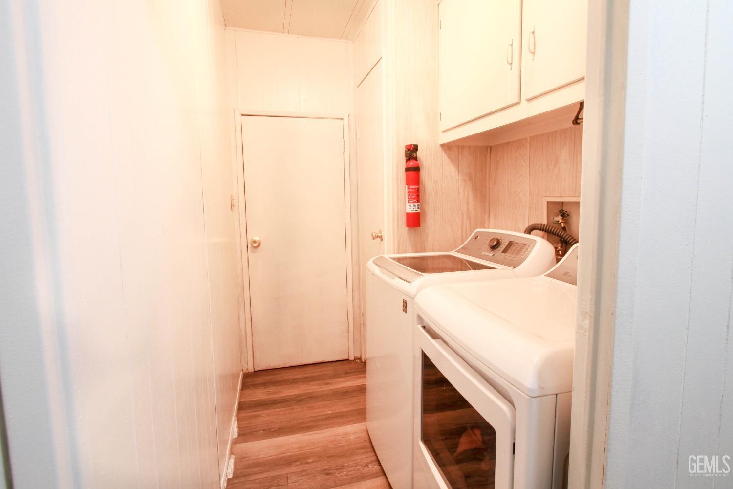 Undisclosed Address Bakersfield, CA 93304 - Photo 24 of 27 a utility room with dryer and washer