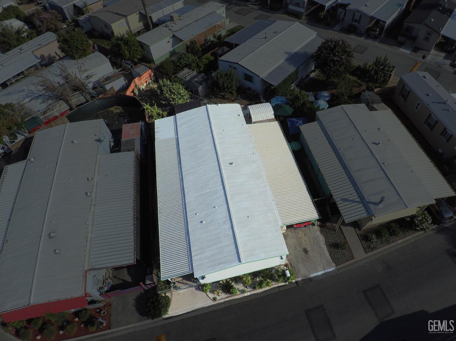 Undisclosed Address Bakersfield, CA 93304 - Photo 27 of 27 an aerial view of a house with a yard