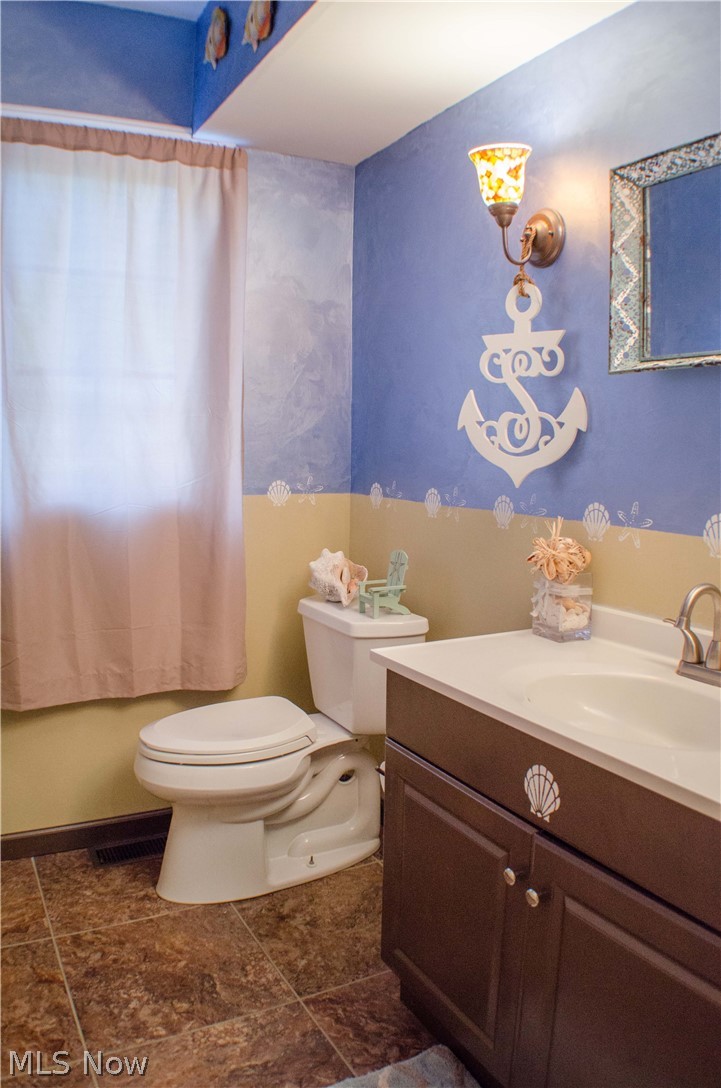 369 Sand Run Road Akron, OH 44313 - Photo 13 of 35 Half bath on the Family room level