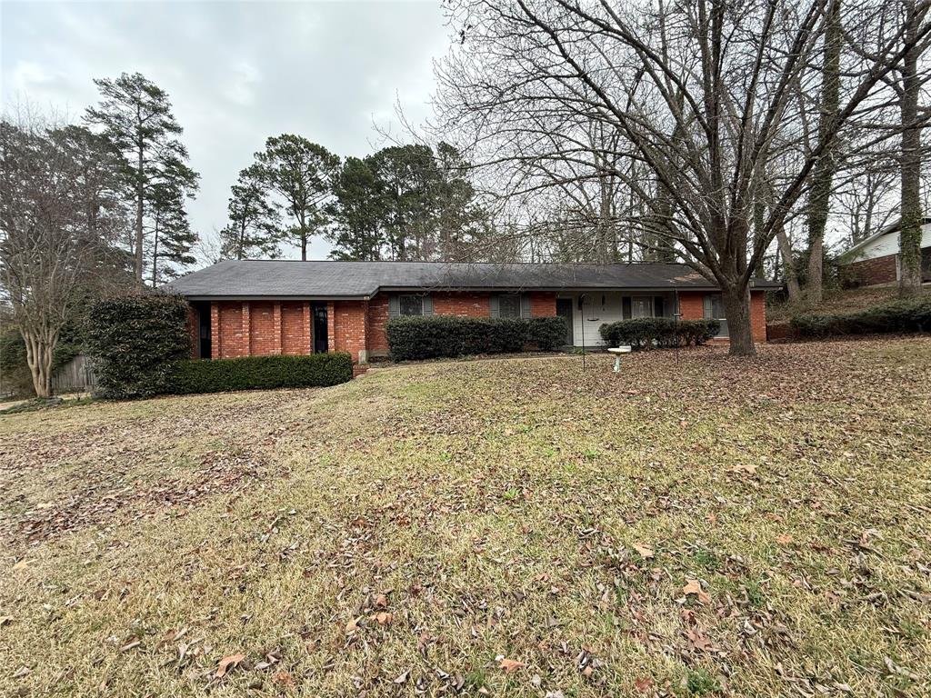 2104 Greenbriar Drive Ruston, LA 71270 - Photo 3 of 35 a house with trees in front of it