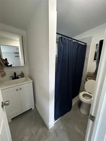 a view of backyard with seating space