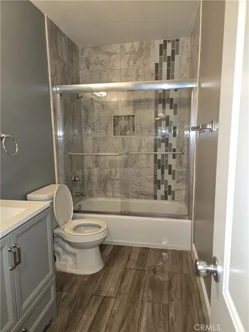 a bathroom with a toilet a sink and a bathtub