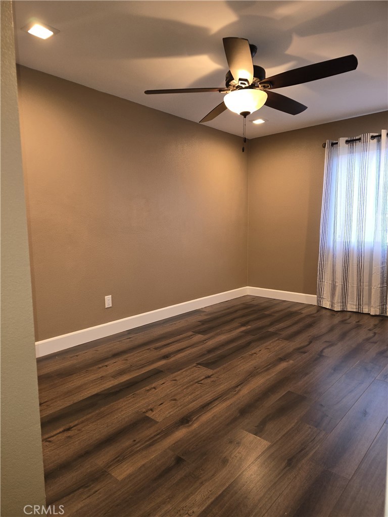 1370 Wheaton Way Riverside, CA 92507 - Photo 17 of 17 wooden floor in an empty room