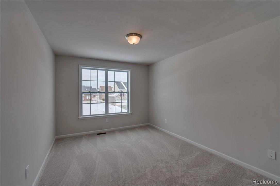 51056 Rockingham Drive Canton, MI 48188 - Photo 7 of 23 bedroom2.jpg