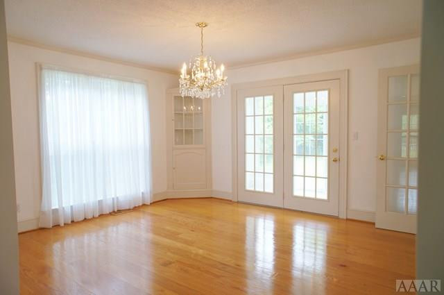 705 Yeopim Road Edenton, NC 27932 - Photo 18 of 35 Dining Room Leads to Sun Room