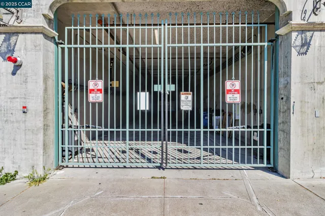 a view of small space with a car park side of the road