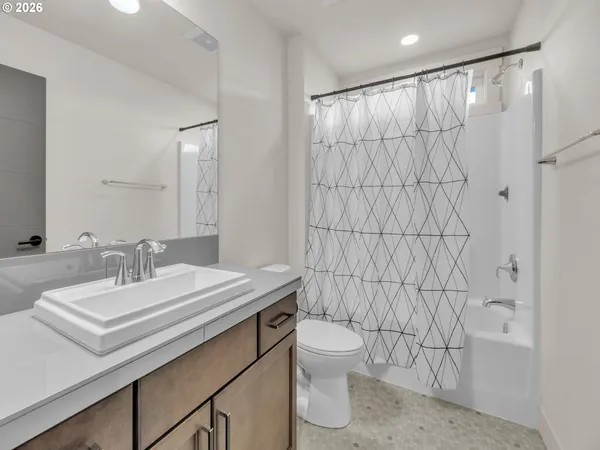a bathroom with a double vanity sink mirror and double
