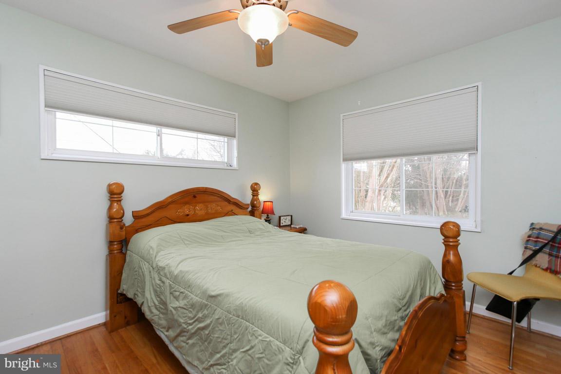 417 Kerwin Road Silver Spring, MD 20901 - Photo 17 of 30 a bedroom with a bed and windows