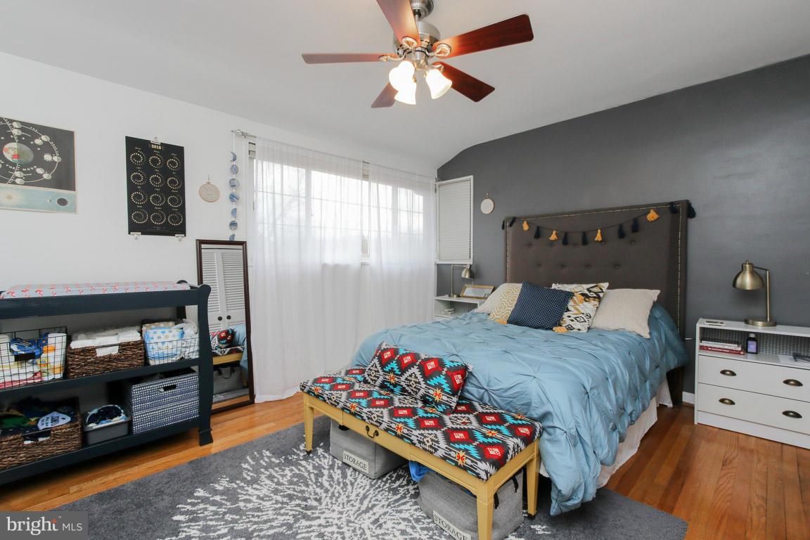 417 Kerwin Road Silver Spring, MD 20901 - Photo 20 of 30 a bedroom with a bed and a dresser in it