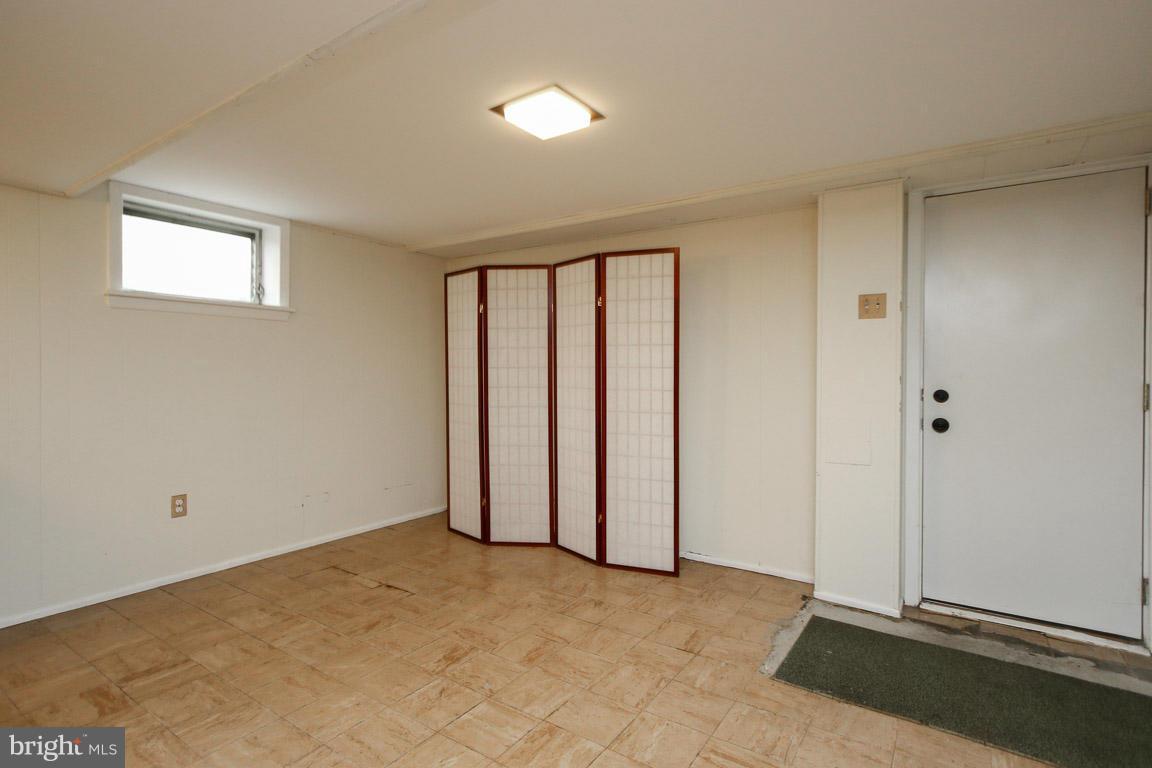 417 Kerwin Road Silver Spring, MD 20901 - Photo 23 of 30 a view of an empty room and window