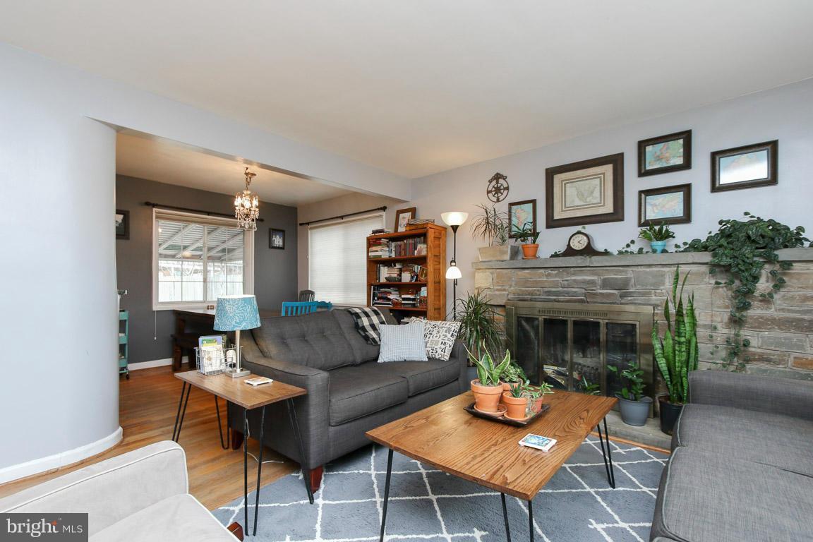 417 Kerwin Road Silver Spring, MD 20901 - Photo 6 of 30 a living room with furniture and a fireplace