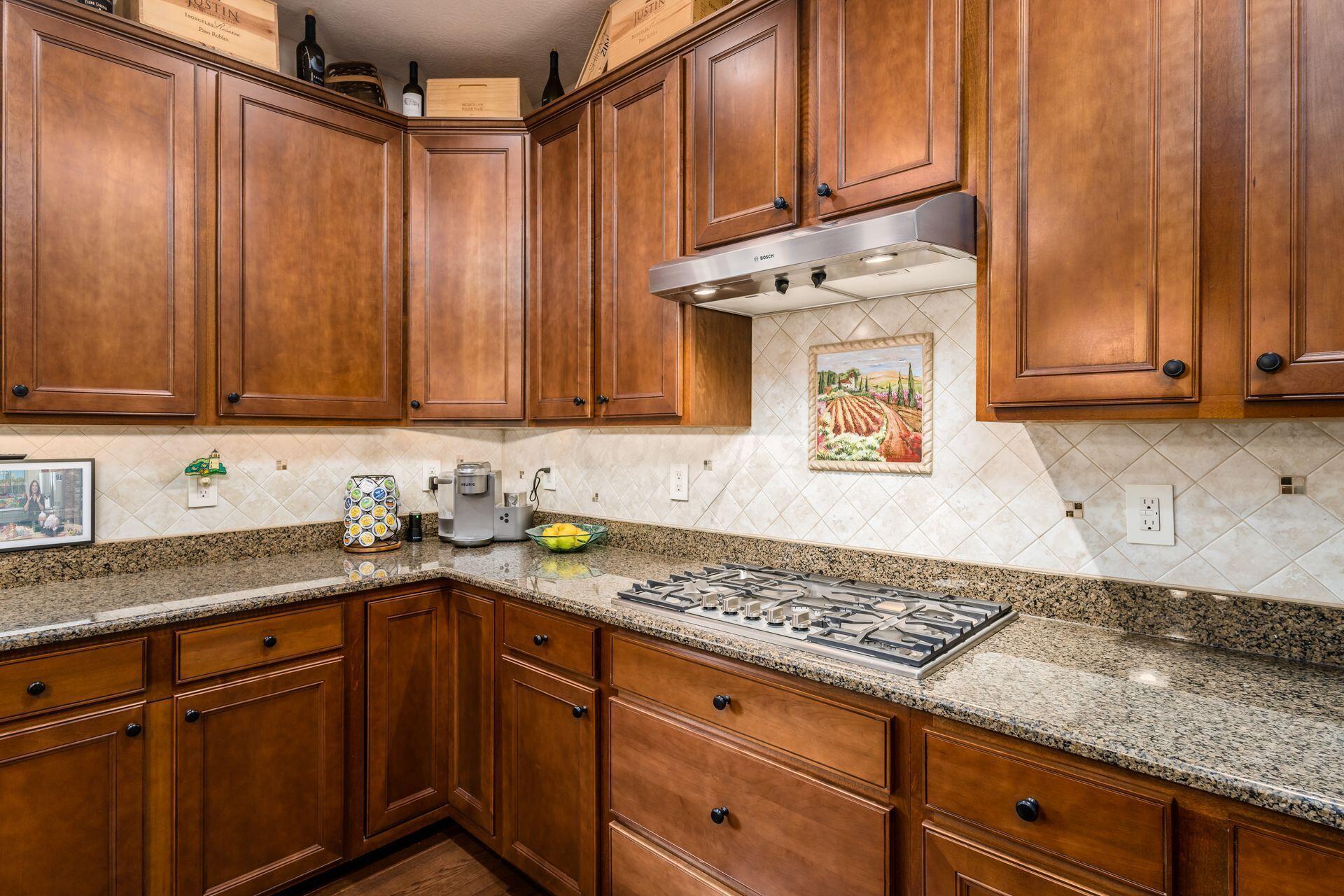 7515 Presidium Loop Galena, OH 43021 - Photo 16 of 66 Thermador cooktop and Bosch hood make cooking a joy