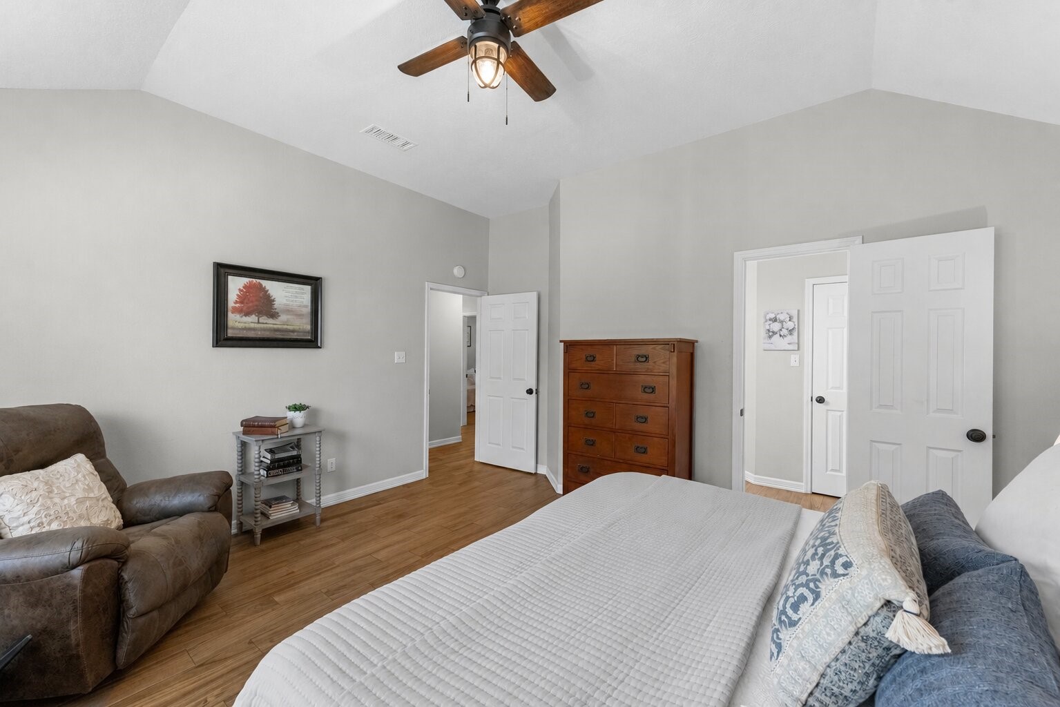 606 Walnut Street Sweeny, TX 77480 - Photo 18 of 28 a bedroom with a bed dresser and a couch