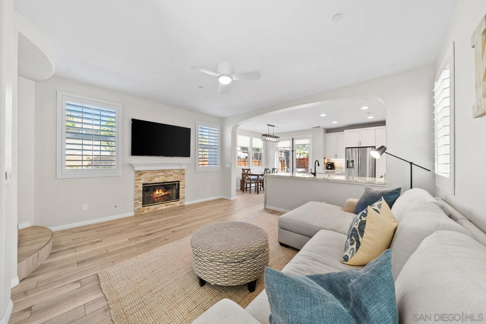17083 Ralphs Ranch Road San Diego, CA 92127 - Photo 14 of 61 a living room with furniture and a flat screen tv