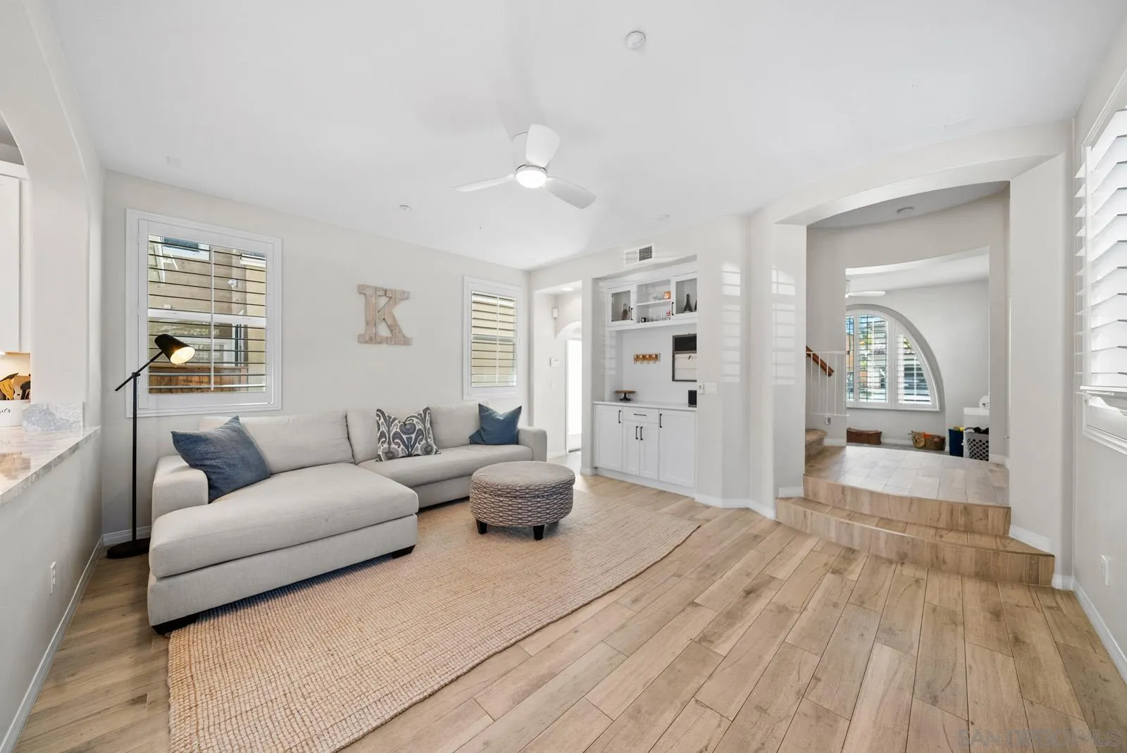 17083 Ralphs Ranch Road San Diego, CA 92127 - Photo 15 of 61 a living room with furniture and a large window