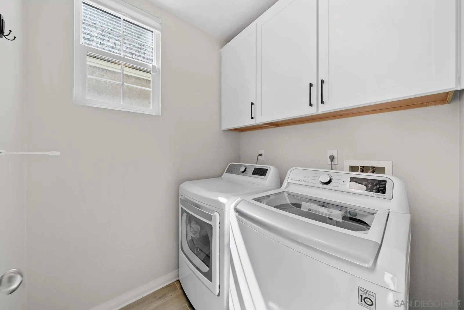 17083 Ralphs Ranch Road San Diego, CA 92127 - Photo 19 of 61 a utility room with dryer and washer