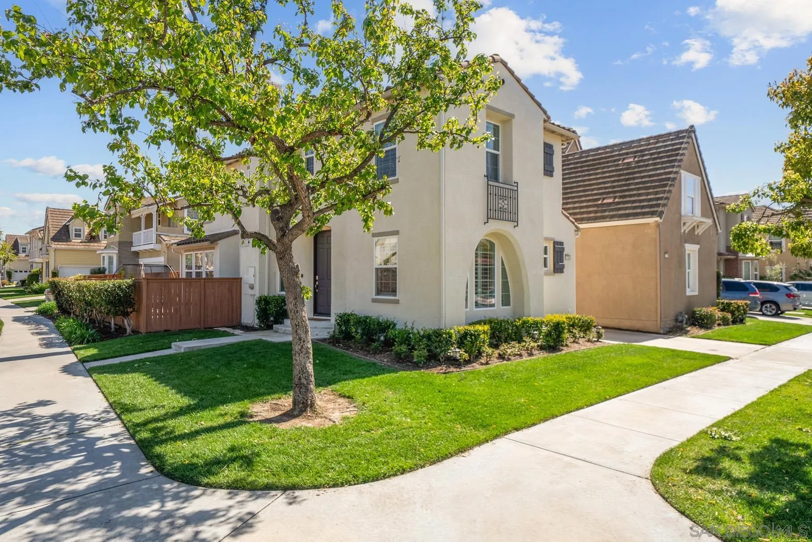 17083 Ralphs Ranch Road San Diego, CA 92127 - Photo 2 of 61 a front view of a house with a yard