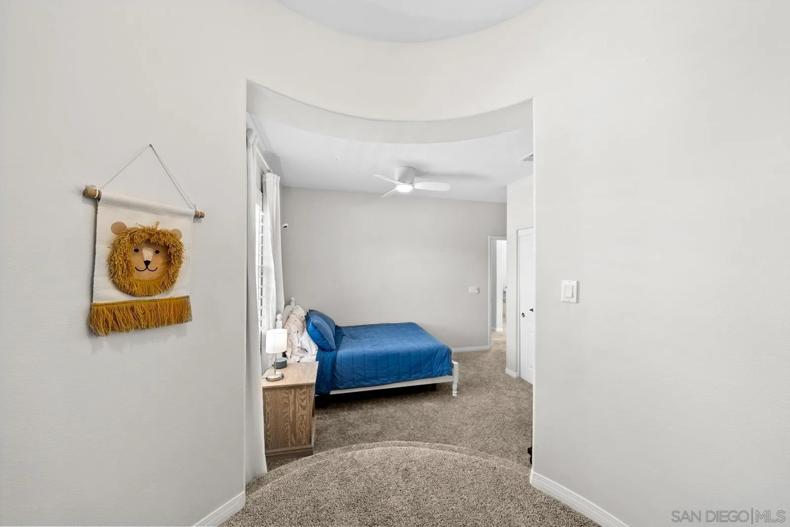 17083 Ralphs Ranch Road San Diego, CA 92127 - Photo 23 of 61 a room with a bed and a painting on the wall