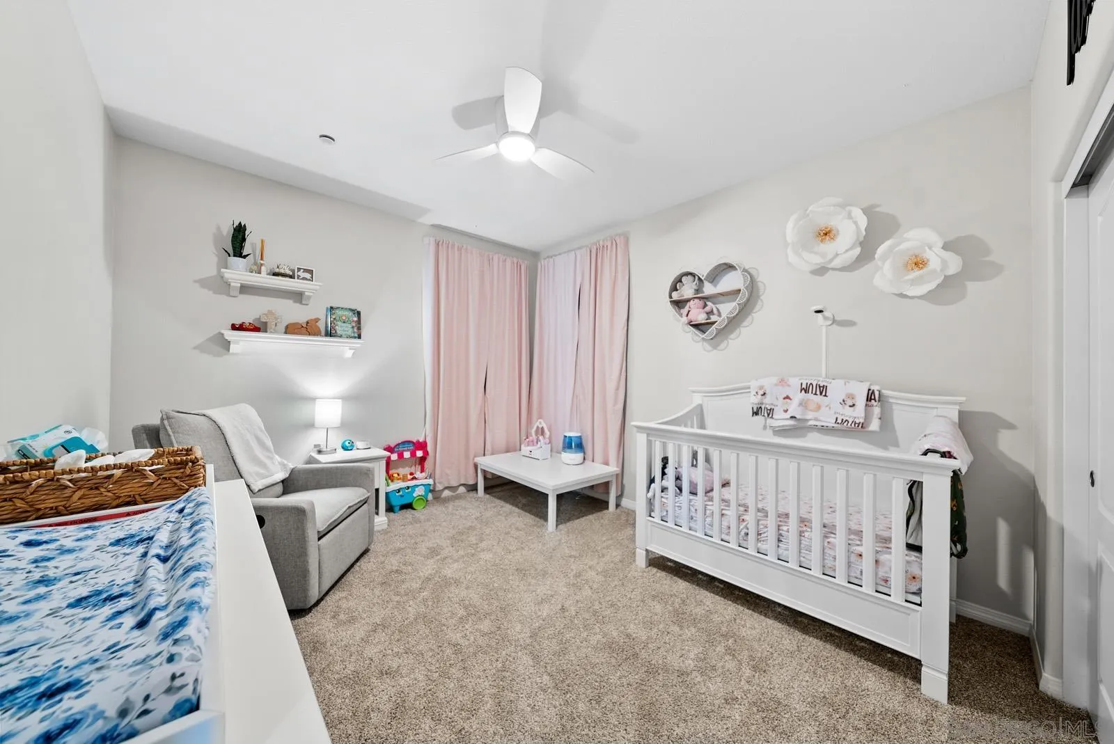 17083 Ralphs Ranch Road San Diego, CA 92127 - Photo 28 of 61 a bedroom with furniture and wooden floor