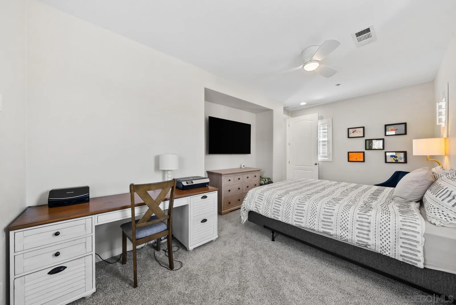 17083 Ralphs Ranch Road San Diego, CA 92127 - Photo 29 of 61 a bedroom with a bed and a flat screen tv