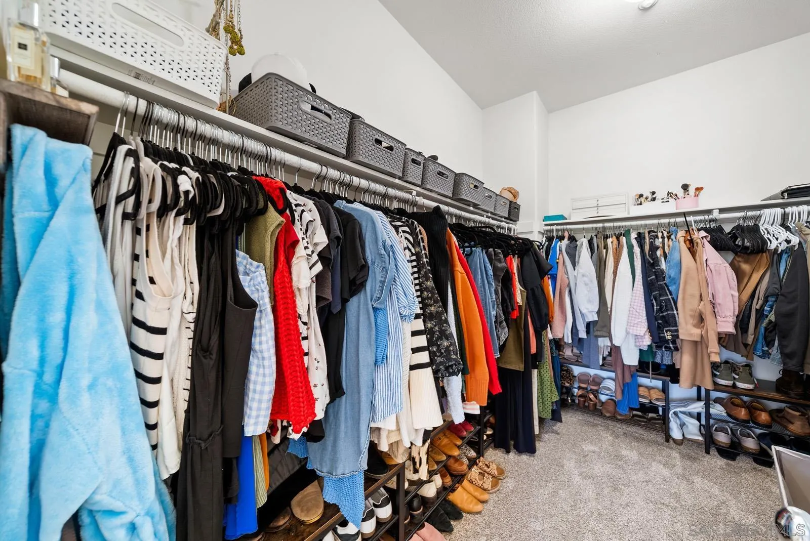 17083 Ralphs Ranch Road San Diego, CA 92127 - Photo 37 of 61 a view of walk in closet with clothes