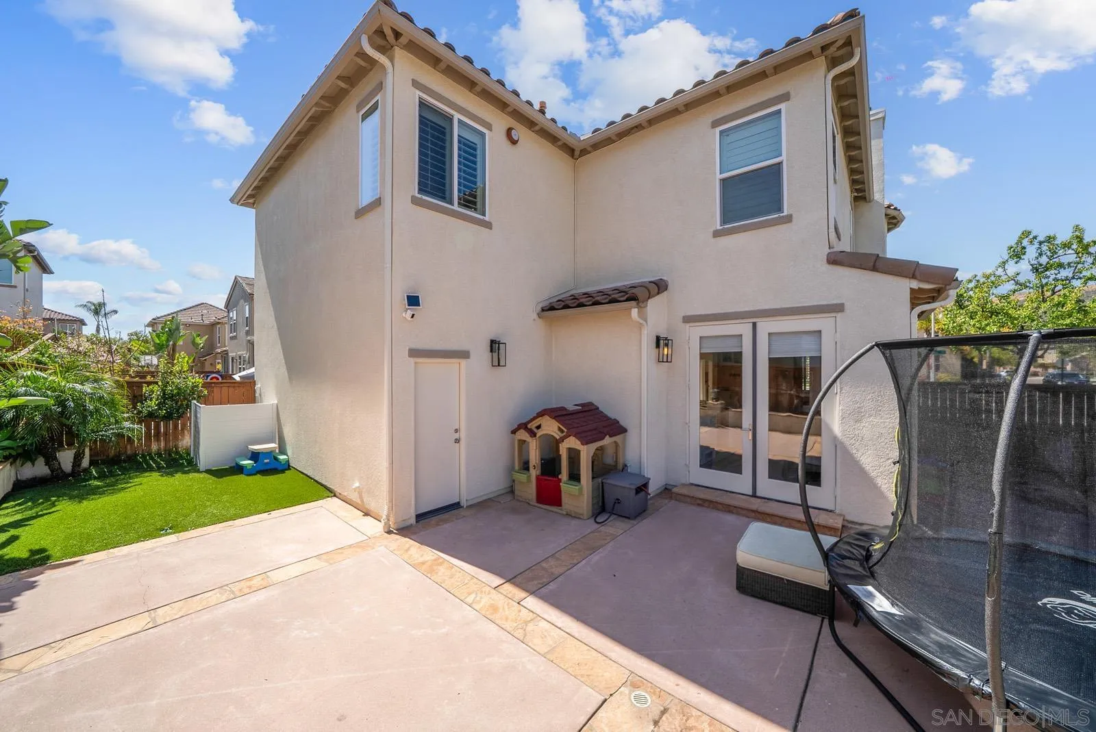 17083 Ralphs Ranch Road San Diego, CA 92127 - Photo 38 of 61 a front view of a house with garden