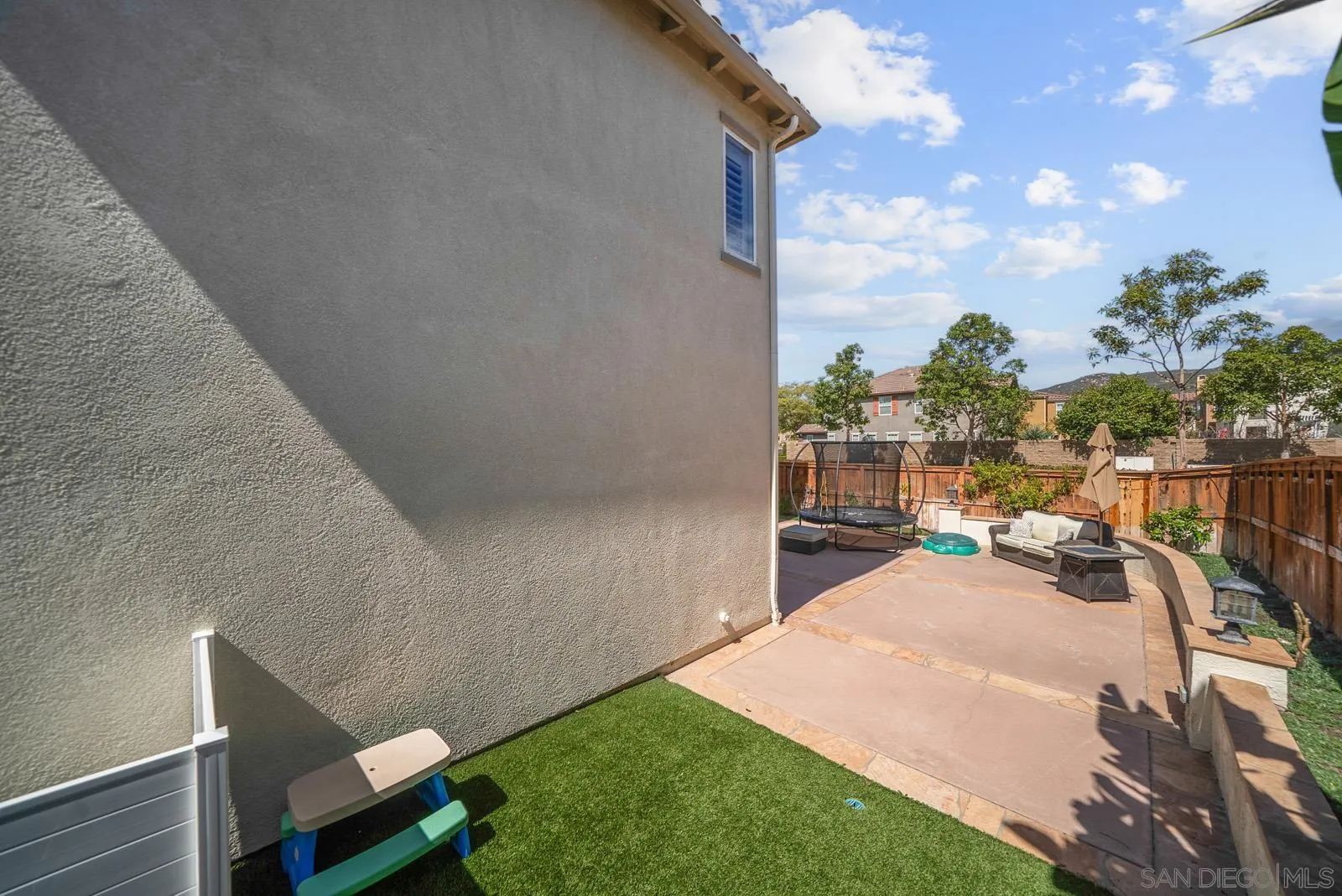 17083 Ralphs Ranch Road San Diego, CA 92127 - Photo 39 of 61 a view of a backyard with sitting area
